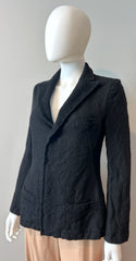 Black wool blazer by Y's by Yohji Yamamoto, tailored fit, featuring classic lapel collar and structured design.