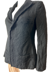 Black wool blazer by Y's by Yohji Yamamoto, size 2, tailored fit with classic lapel and button closure, styled on a hanger.