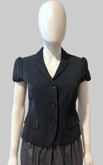 Moschino Cheap and Chic blazer in size 8, tailored women's clothing with a stylish, fitted design and classic lapel collar.