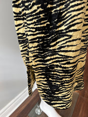 Ganni yellow and black crinkle dress in size XS, showcasing its vibrant pattern and relaxed fit.