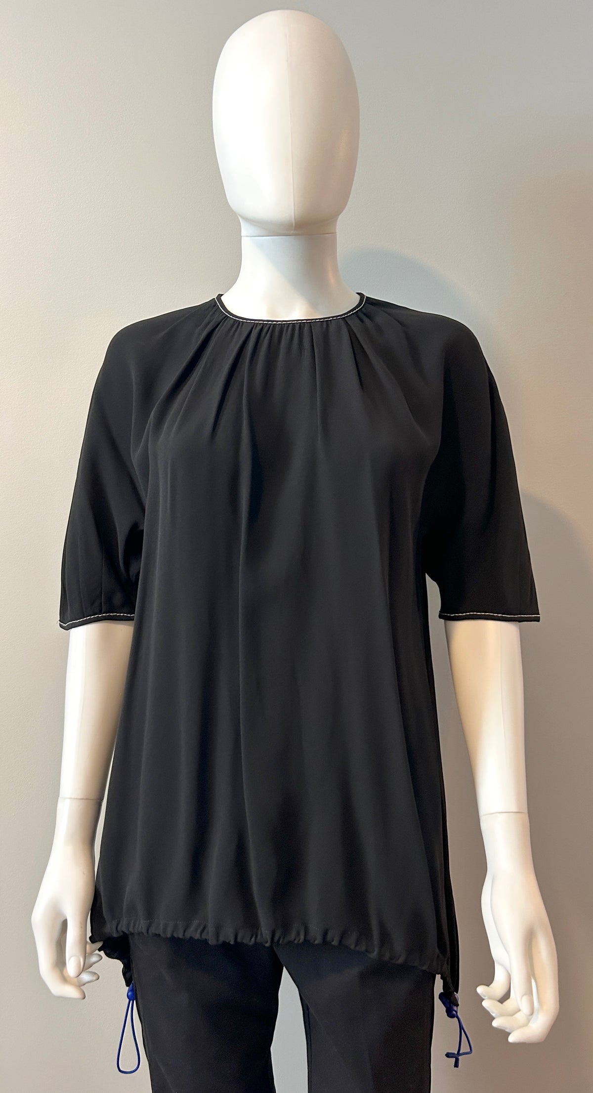 Marni black tunic in size 42/8, stylish clothing item, shown hanging on a hanger with a simple background