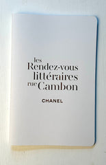 Chanel lined notebook with elegant cover, featuring the iconic Chanel logo and classic design, perfect for writing or note-taking.