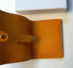 Bvlgari leather travel watch case, new in box, with sleek design and secure compartments for protecting luxury watches.