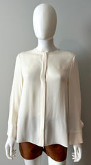 Fendi cream blouse size 40/6, elegant women’s clothing with soft fabric and stylish design, displayed on a hanger.