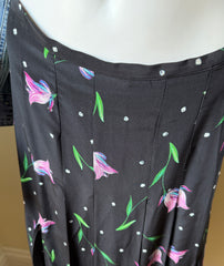 Rixo Georgia silk skirt in size small, shown with flowing fabric and elegant design, perfect for stylish women.