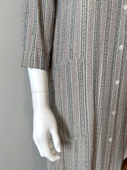 Raquel Allegra grey stripe duster dress in size XS, featuring a flowing silhouette and lightweight fabric, displayed on a hanger.