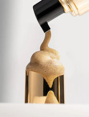 Bondi Sands self tanning foam bottles in three shades, showing the product's smooth foam texture and colorful packaging.