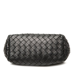 Black Bottega Veneta Intrecciato flap pouch bag with woven leather design and sleek, minimalist style.