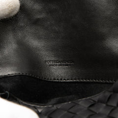 Black Bottega Veneta Intrecciato flap pouch bag with woven leather design and sleek, compact shape.