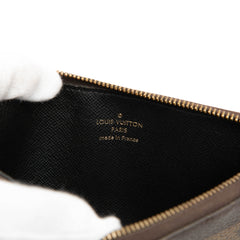 Louis Vuitton Monogram Reverse Giant Trio Pouch Set, stylish SLG with iconic monogram design and spacious compartments