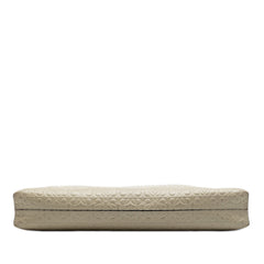 LOEWE embossed Anagram leather repeat T clutch bag with textured design and sleek shape, perfect for stylish accessories.