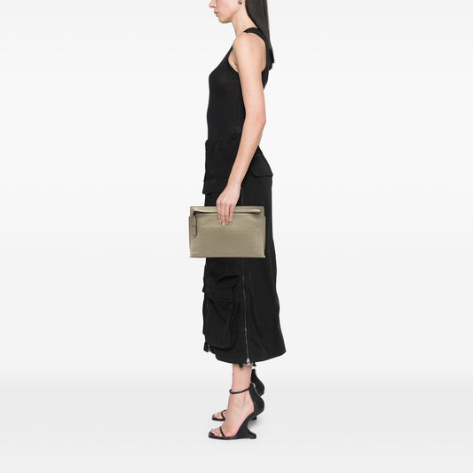 LOEWE Embossed Anagram Leather Repeat T Clutch bag with sleek design and embossed logo, featuring a zip closure and stylish appearance.