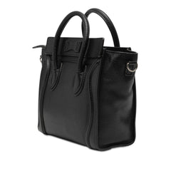Celine Nano Leather Luggage Tote bag in beige with structured design and top handles, shown from side view.