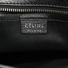 Celine Nano Leather Luggage Tote in beige with dual top handles and spacious interior, stylish designer bag for everyday use.