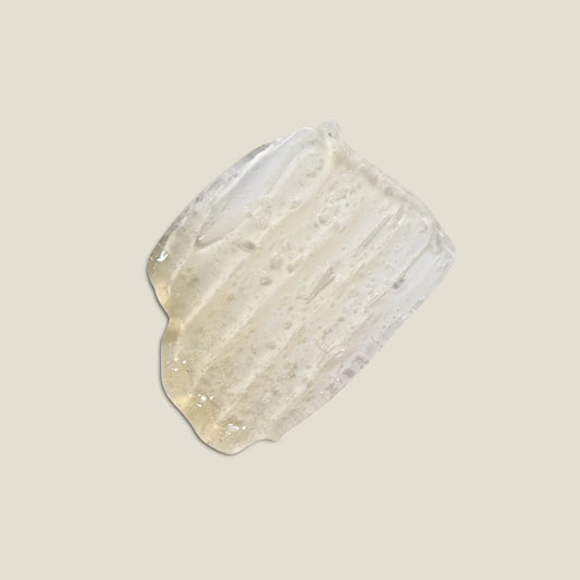 Cole Omega Cleansing Balm 100ml, close-up of the balm's smooth, rich texture in a beauty product image.