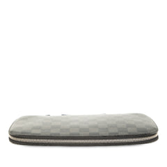 Louis Vuitton Damier Graphite Atoll organizer SLG in black with checkered pattern and multiple card slots.