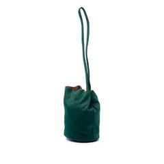 Small Bottega Veneta pony hair drop bucket bag in vibrant green, featuring a stylish design and compact silhouette.