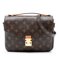 Louis Vuitton Monogram Pochette Metis brown bag with leather trim and gold hardware, featuring signature monogram pattern.