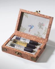 Empty embossed leather travel perfume trunk from The Maker, featuring compact SLG design and intricate embossed details.