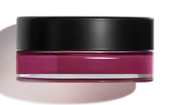 Chanel N°1 de Chanel Lip and Cheek Balm in vibrant coral, showing smooth, creamy texture and sleek packaging.
