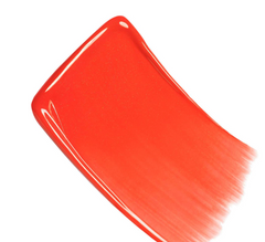 Chanel N°1 de Chanel Lip and Cheek Balm in vibrant coral, showing the sleek packaging and creamy balm texture.