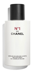 Chanel N°1 de Chanel revitalizing body serum-in-mist 140ml, clear spray bottle with elegant branding and transparent cap.
