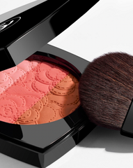 Chanel Camélia Futura powder blush trio in a sleek compact with three shades for a natural, radiant makeup look.