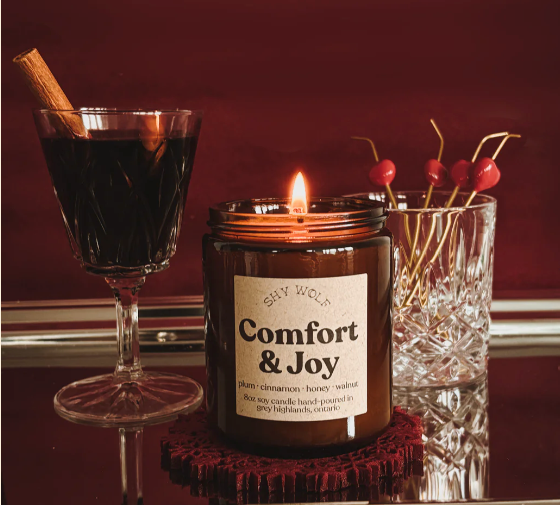Shy Wolf Candles Comfort & Joy home candle with a cozy label design and warm, inviting aesthetic.
