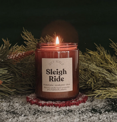 Shy Wolf Candles Sleigh Ride home decor candle with a cozy winter scene, perfect for festive or seasonal interior ambiance.