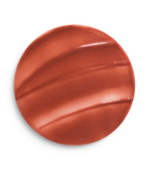 Hermès Silky Lipstick Shine in various shades, showcasing smooth, glossy finish and elegant packaging for luxury beauty.