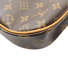 Louis Vuitton Monogram Odeon PM brown bag with leather handles and gold-tone hardware, showcasing a stylish and compact design.
