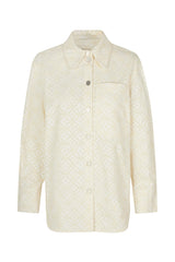 BAUM UND PFERDGARTEN Mahina organic cotton eyelet shirt jacket in cloud dancer color, showing button front and eyelet details.
