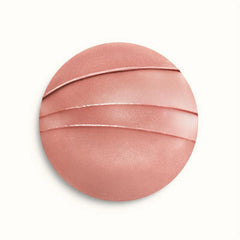 Hermès Silky Lipstick Shine in beige shade, showcasing smooth, glossy lipstick with elegant packaging.