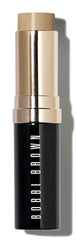 Bobbi Brown Moisturizing Stick Foundation in three shades, new in box, showcasing smooth, portable makeup for glowing skin.