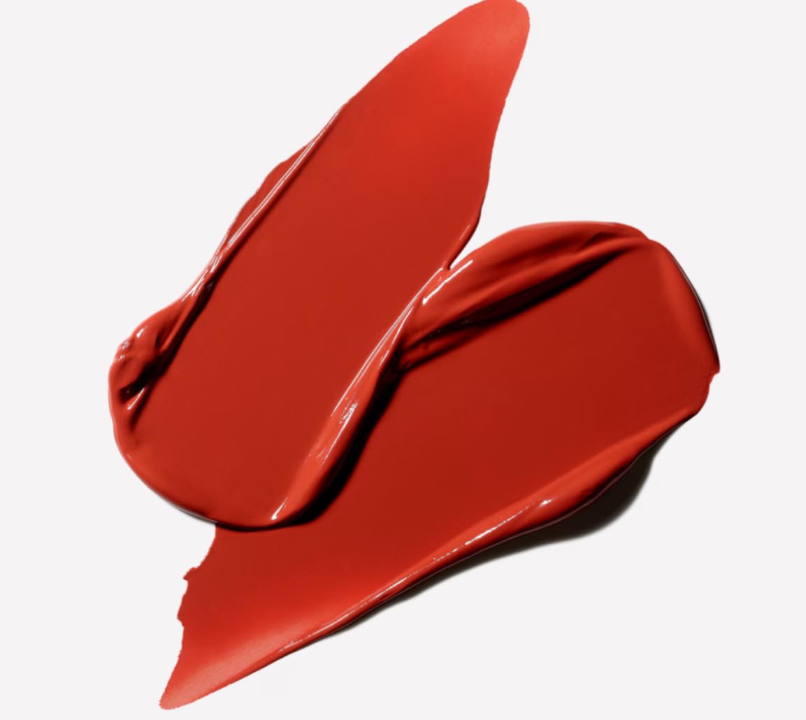 M.A.C Retro Matte Liquid Lipcolour in Chili Addict, vibrant red-orange shade, applicator with liquid lipstick tube.