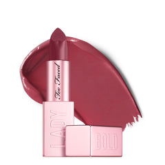 Too Faced Lady Bold Lipstick in various shades, new in box, showcasing vibrant lipstick colors and sleek packaging.