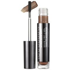 Milk Makeup Kush High Roll Defining Tubing Eyebrow Gel in various shades, with the product tube visible and open applicator.