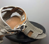 Givenchy taupe leather cage gladiator sandals, size 35, featuring strappy design and open-toe style.