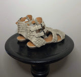 Givenchy taupe leather cage gladiator sandals size 35 with intricate strap design and open toe style.