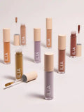 Ilia Liquid Powder Eye Tint in matte and chromatic shades, featuring a sleek tube and applicator, new in box for natural eye makeup.