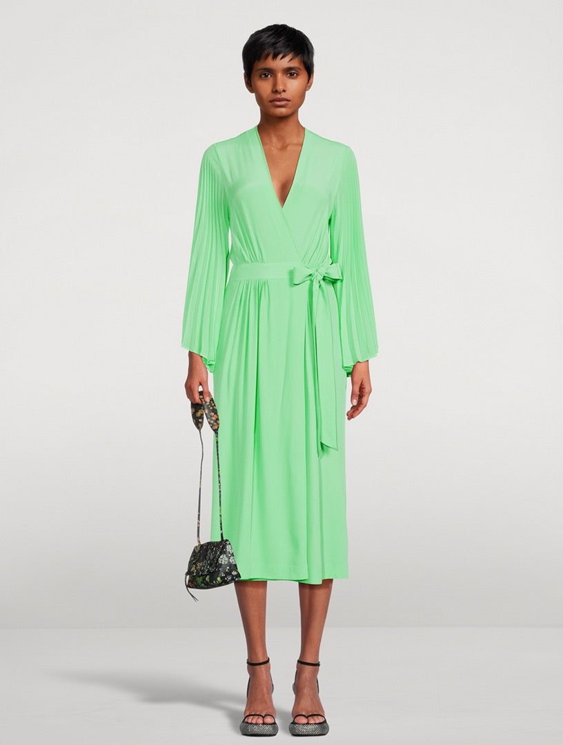 Dries Van Noten Dooley dress in size 36, new with tags, showing a stylish, patterned clothing piece with a fitted silhouette.