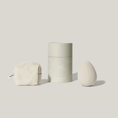 Maude Drop Body Massager, a sleek pleasure device with smooth design, shown in a modern, minimalist setting.