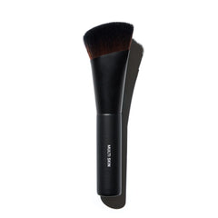 Gee Beauty Multi Skin Brush NIB for beauty skincare, showcasing soft bristles and ergonomic handle for gentle application.