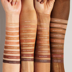 Fenty Beauty Sun Stalk'r Instant Warmth Bronzer in various shades, compact with warm-toned powder for a natural glow.