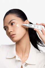 Dior Total Capture Retouch Stick in a sleek black makeup compact, designed for instant touch-ups and blemish concealment.