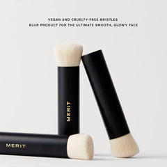 Merit Brush No. 1 Tapered Blending Brush beauty tool with soft bristles for seamless makeup blending, close-up view on a white background.