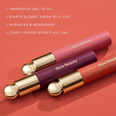 Rare Beauty Soft Pinch Tinted Lip Oil in various shades, featuring a sleek applicator and vibrant, glossy lip stain.