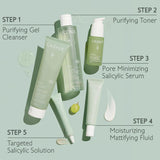 Caudalie Vinopure color correcting spot solution with salicylic acid in 15ml bottle, for blemish treatment and skin clarity.