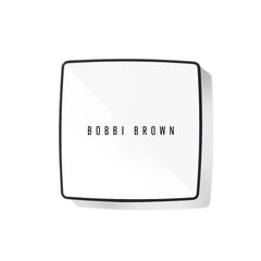 Bobbi Brown Vitamin Enriched Pressed Finishing Powder in Yellow, a close-up of the compact with the powder inside.