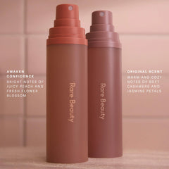 Rare Beauty Find Comfort body and hair fragrance mist with Niacinamide, NWOB, featuring sleek packaging and spray nozzle.